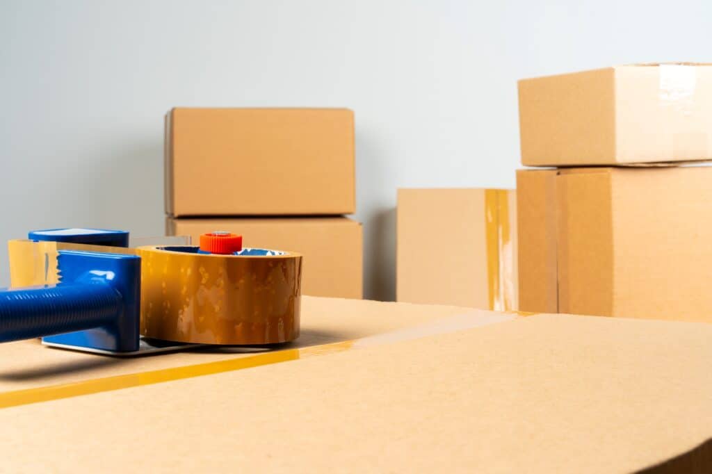 Stacks of moving boxes with packing tape